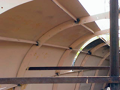 Roberts 345 Gallery - photos showing fitting of plates to radius chine hull - underside of radius plates