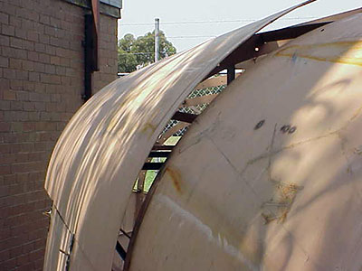 Roberts 345 Gallery - photos showing fitting of plates to radius chine hull - another radius plate ready to fit into position