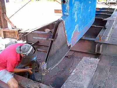 Mauritius / Norfolk 43 Gallery rudder modification - side plates being welded on