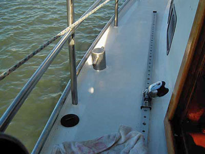 Roberts 482 Gallery - deck detail, stainless bollard bulwark cap and rails,genoa track