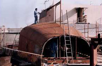 A radius chine Roberts 532 hull under construction 